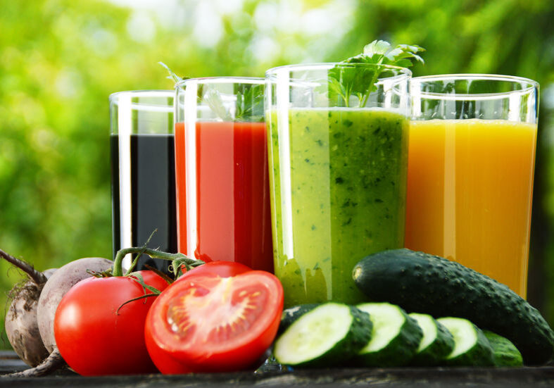 30405438 - glasses with fresh vegetable juices in the garden  detox diet